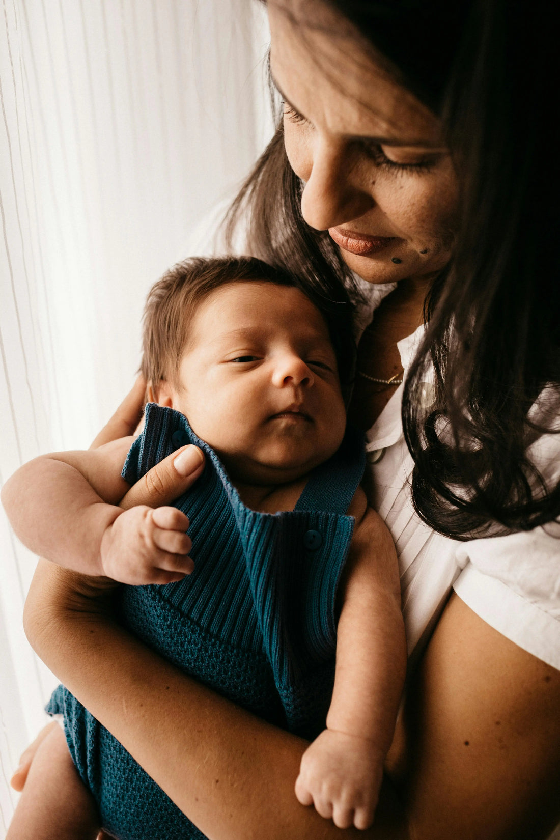 mom waking baby after naptime