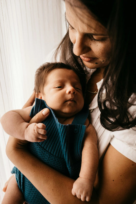 mom waking baby after naptime