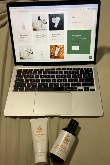 Gentle Beginnings - Baby Bundle with white Ayurvedic baby cream tube and massage oil bottle, featuring botanical labels