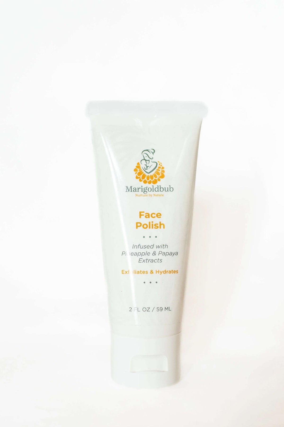 Pineapple and Papaya Skin Polish in a pale cream tube with orange and green branding, labeled Face Polish