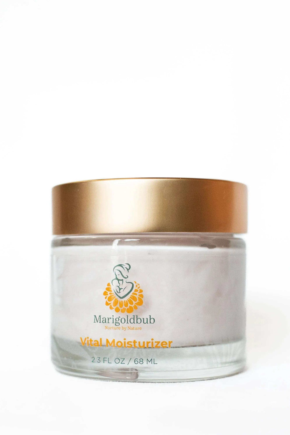 Vital Moisturizer in a clear glass jar with a metallic gold lid, white cream, and orange and green label